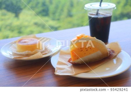 Delicious looking sweet fruit cake and iced coffee 93429241