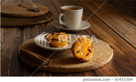Typical Portuguese squash dessert with coffee Typical Portuguese squash dessert with coffee 93435364