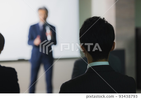 A man with gray hair giving a speech 93438793