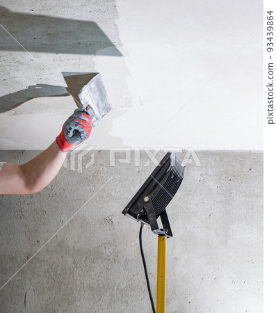 Application of lime plaster on the ceiling, repair work with environmentally friendly lime. Application of lime plaster on the ceiling, repair work with environmentally friendly lime. 93439864