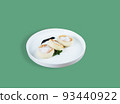 A white plate with morning breakfast - cottage cheese cakes on a green background. 93440922