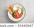 Plate on a light background with a set ball with salmon and avocado 93440947