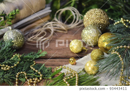 Christmas decoration with fur tree branches, jute rope and sackcloth Christmas decoration with fur tree branches, jute rope and sackcloth 93443411