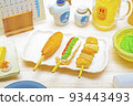 Miniature izakaya interior and various food miniatures with three skewers of yakitori 93443493