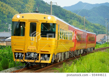 Limited Express "Iyonada Monogatari (Dōgo Chapter)" Coming Down an Embankment 93444611