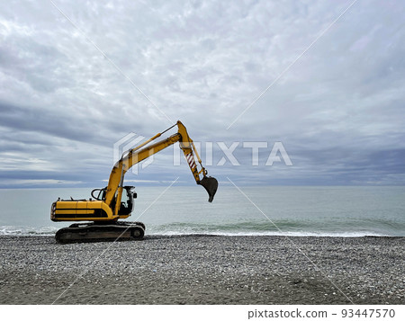 Excavator working on earthmoving at open pit mining  93447570