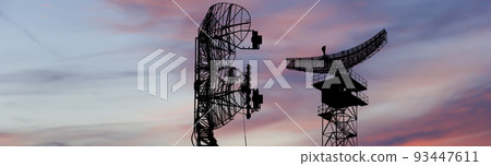 Air defense radars of military mobile anti aircraft systems, modern army industry on the background of the sunset orange sky, Russia 93447611