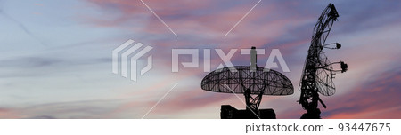 Air defense radars of military mobile anti aircraft systems, modern army industry on the background of the sunset orange sky, Russia 93447675