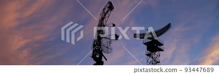 Air defense radars of military mobile anti aircraft systems, modern army industry on the background of the sunset orange sky, Russia 93447689