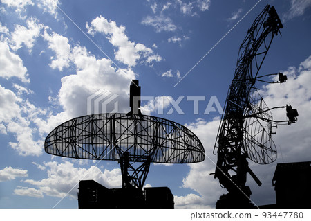 Air defense radars of military mobile anti aircraft systems, modern army industry on background beautiful clouds and sky, Russia 93447780