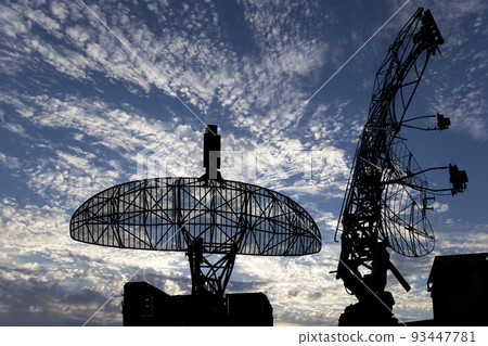 Air defense radars of military mobile anti aircraft systems, modern army industry on background beautiful clouds and sky, Russia 93447781