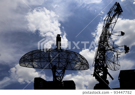 Air defense radars of military mobile anti aircraft systems, modern army industry on background beautiful clouds and sky, Russia 93447782