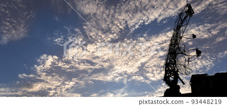 Air defense radars of military mobile anti aircraft systems, modern army industry on background beautiful clouds and sky, Russia Air defense radars of military mobile anti aircraft systems, modern army industry on background beautiful clouds and sky, Russia 93448219