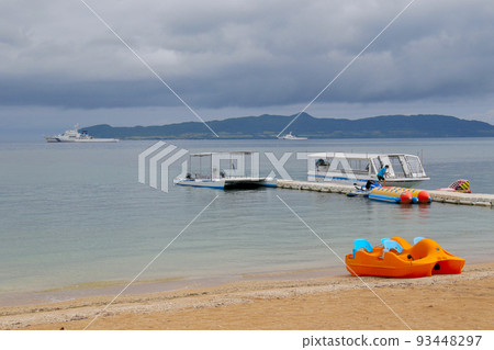 View of the Japan Coast Guard patrol boat and glass-bottomed boat from Fusaki Beach, Ishigaki Island View of the Japan Coast Guard patrol boat and glass-bottomed boat from Fusaki Beach, Ishigaki Island 93448297