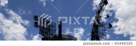 Air defense radars of military mobile anti aircraft systems, modern army industry on background beautiful clouds and sky, Russia 93448385