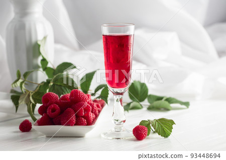 Raspberry liquor and fresh berries. Raspberry liquor and fresh berries. 93448694