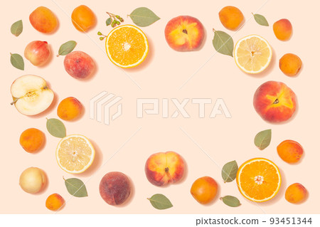 Trendy summer background - tropical fruits on a pink background Trendy summer background - tropical fruits on a pink background 93451344