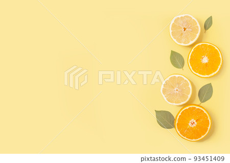 Delicate yellow background with fruits 93451409