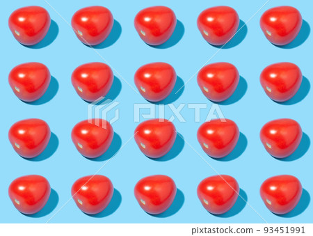 Red ripe tomatoes on a blue background 93451991