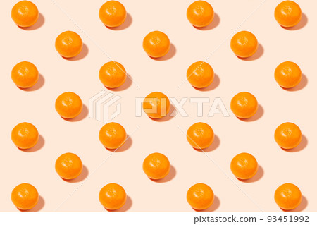 Ripe tangerines on pastel background - creative pattern 93451992