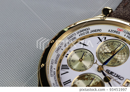 close up on Time zone cities name on luxury world time watch bezel. 93451997
