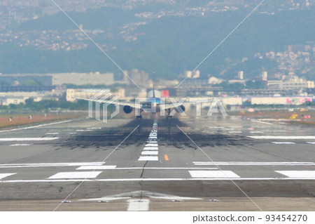 Passenger plane taking off from Itami Airport Passenger plane taking off from Itami Airport 93454270