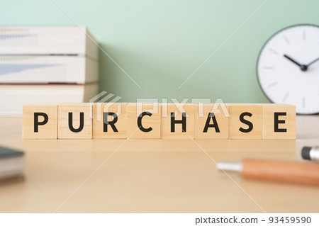 Purchase image | A desk with a block written "PURCHASE" 93459590