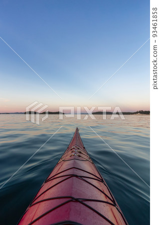 Sea Kayak paddling in the Pacific Ocean. Colorful Sunset Sky. Sea Kayak paddling in the Pacific Ocean. Colorful Sunset Sky. 93461858