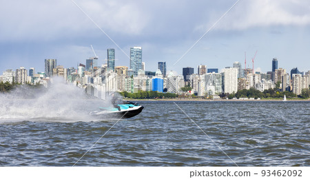 Adventurous Caucasian Woman on Water Scooter riding in the Ocean. Adventurous Caucasian Woman on Water Scooter riding in the Ocean. 93462092