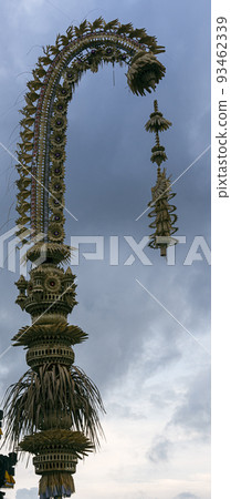 Indonesia - Top of Penjor is seen in preparation for Galungan Day in Bali Indonesia - Top of Penjor is seen in preparation for Galungan Day in Bali 93462339