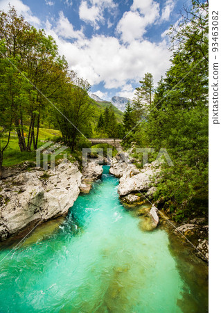 Emerald Soca River in Soca Valley, Slovenia, Europe. Emerald Soca River in Soca Valley, Slovenia, Europe. 93463082