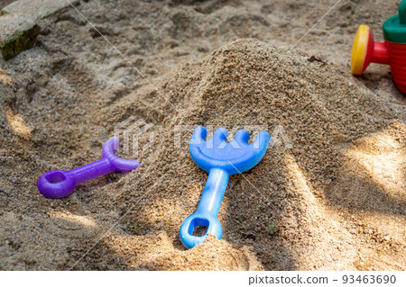 Sandbox and children's play equipment in the park 93463690