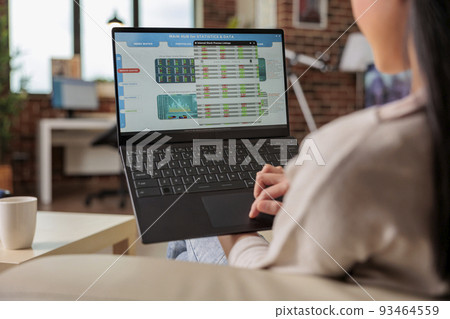 Asian woman freelancer working from home on business app. home business laptop computer businesswoman office working sitting woman work communication internet people online happy technology 93464559