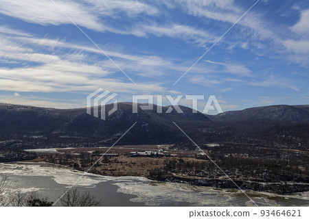Bear Mountain, NY at winter time. Scenic overlook of bear mountain and Hudson Valley. Blue sky and cloudy day. 93464621