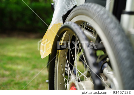 Asian disability woman with urine bag on wheelchair. Asian disability woman with urine bag on wheelchair. 93467128