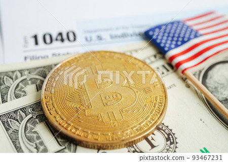 Tax form 1040 U.S. Individual Income Tax Return and bitcoin, business finance, Digital currency, Virtual cryptocurrency concept. 93467231