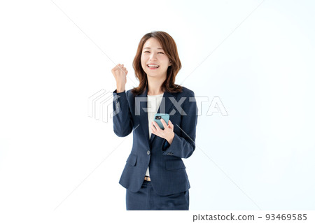 Business smartphone woman doing a guts pose Business smartphone woman doing a guts pose 93469585