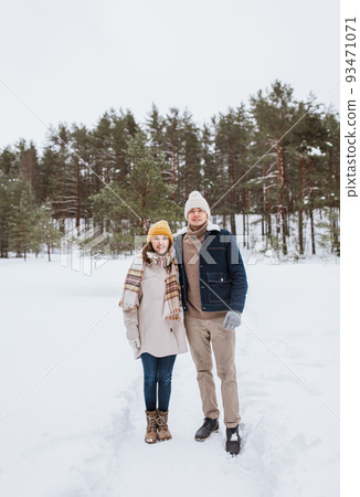 happy smiling couple in winter park happy smiling couple in winter park 93471071