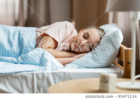 girl sleeping in bed at home girl sleeping in bed at home 93471114