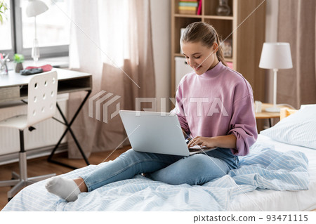student girl with laptop computer learning at home student girl with laptop computer learning at home 93471115
