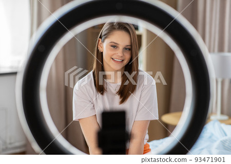 girl blogger with ring light streaming at home girl blogger with ring light streaming at home 93471901
