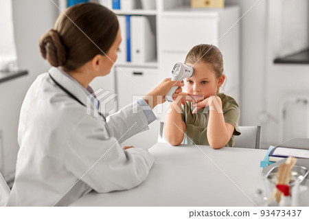 female doctor and little girl patient at clinic female doctor and little girl patient at clinic 93473437