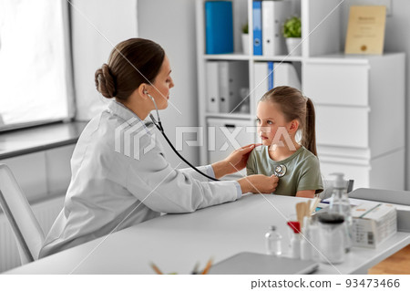 doctor with stethoscope and girl patient at clinic doctor with stethoscope and girl patient at clinic 93473466