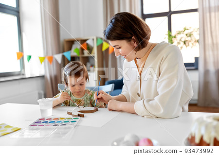 mother with child coloring easter bunny at home mother with child coloring easter bunny at home 93473992