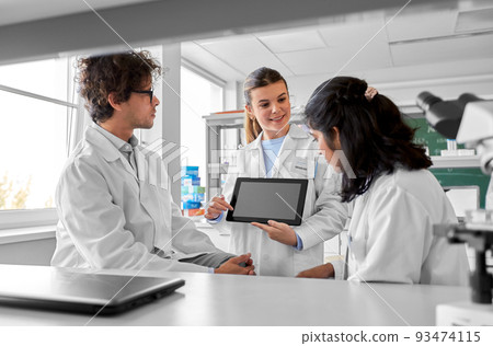 scientists with tablet pc working in laboratory scientists with tablet pc working in laboratory 93474115