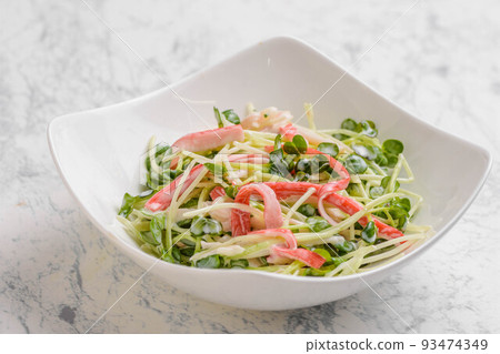 Radish sprout and crab stick salad 93474349