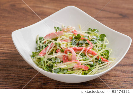 Radish sprout and crab stick salad 93474351