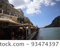 A seaside cafe district in a port town 93474397