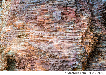 Abstract background from toned mountains texture, volcanic basalt as in Iceland. Bright colorful rock texture background for your design. Close-up 93475972