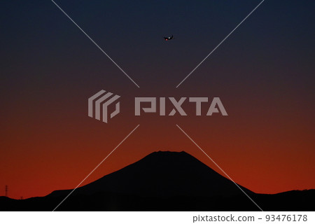 C-130 Hercules flying in the evening 93476178